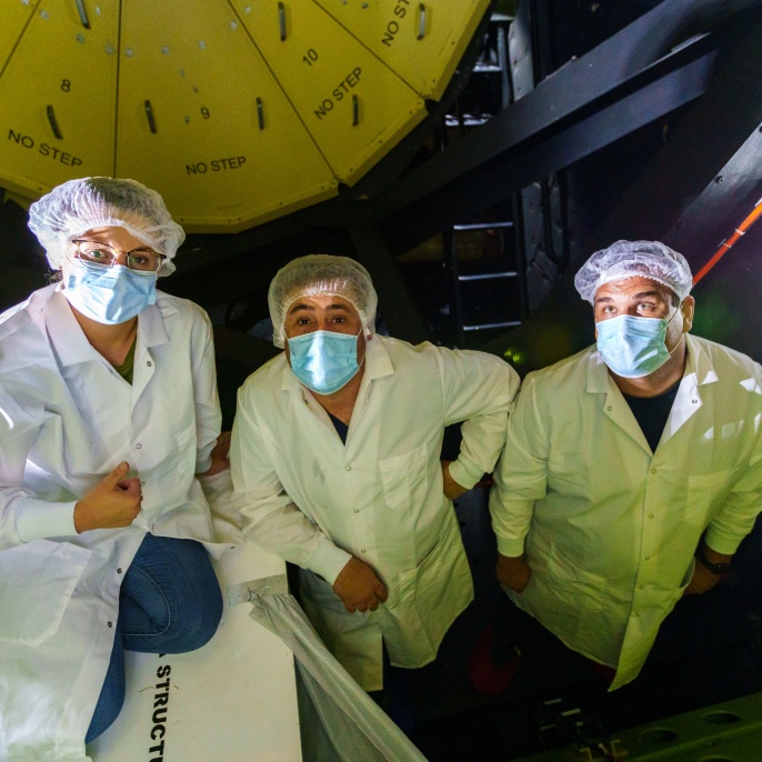 DSI-Team in Schutzkleidung für Arbeiten in der Cavity